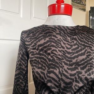 Animal print dress with shoulder pads